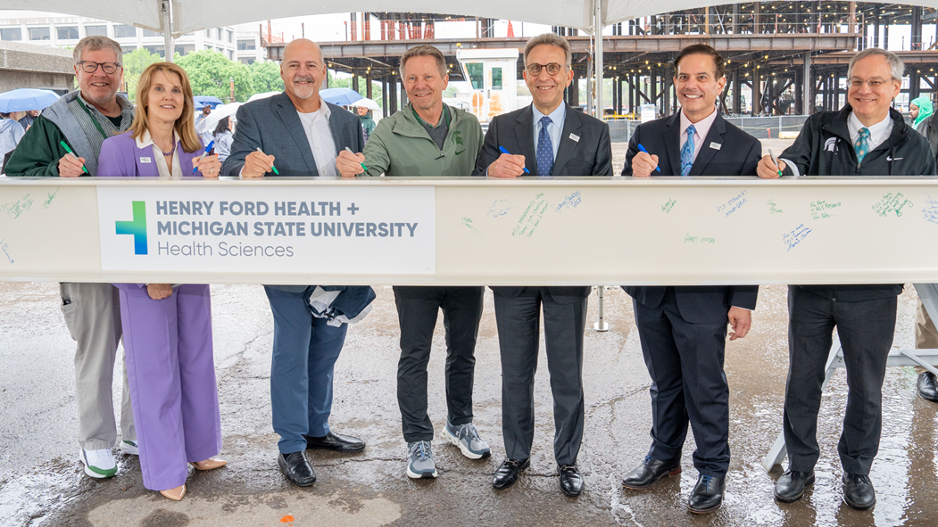 partnership beam signing cropped image