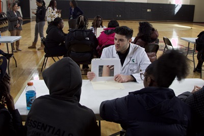 MSU medical student teaching high school students